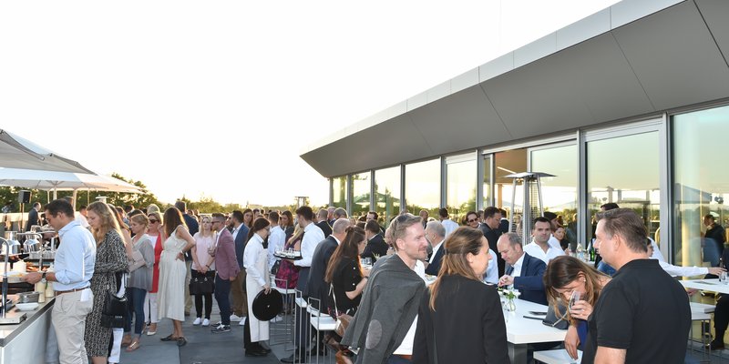 Rooftop with panoramic views and car scenery