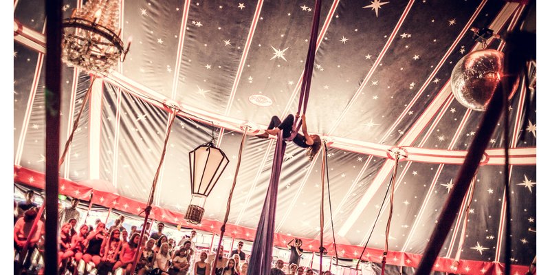 Summer open air location with circus character