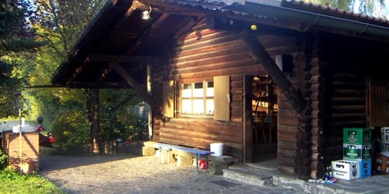 Pond site with log cabin
