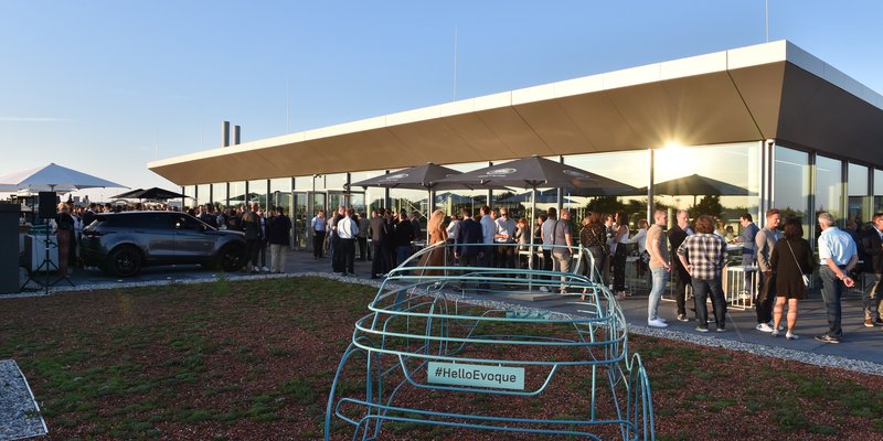 Rooftop with panoramic views and car scenery