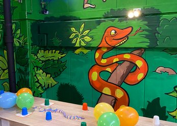 Indoor playground with e-cart track