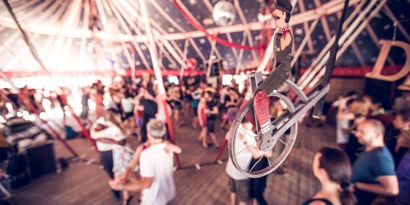 Summer open air location with circus character